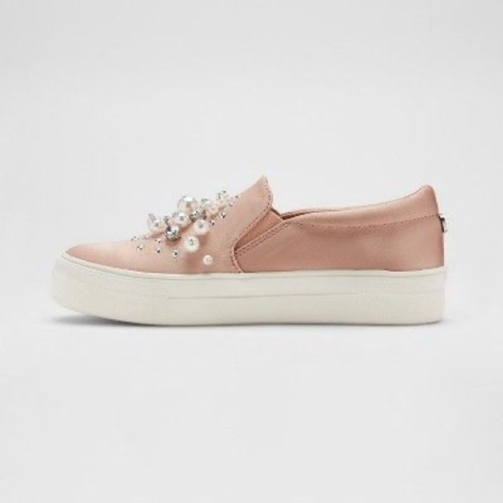 Pink slip on sneakers